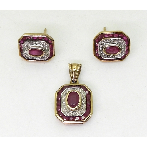 800 - Ruby and diamond set, comprising of a pendant with matching earrings set with oval rubies and diamon... 