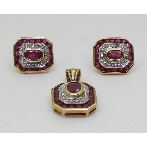 800 - Ruby and diamond set, comprising of a pendant with matching earrings set with oval rubies and diamon... 