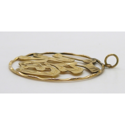 2702 - A CHINESE SYMBOL PENDANTstamped 14k engraved with bamboo patterns. Diameter 4.9cm, weight 8.4gms... 