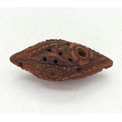 2705 - A COLLECTIONincluding a string of Chinese hediao nut carved beads, each carved with a different face... 