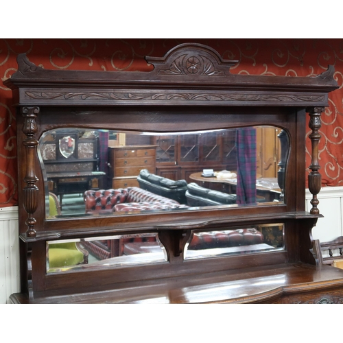 20 - A Victorian oak mirror backed sideboard, 215cm high x 193cm wide x 63cm deep