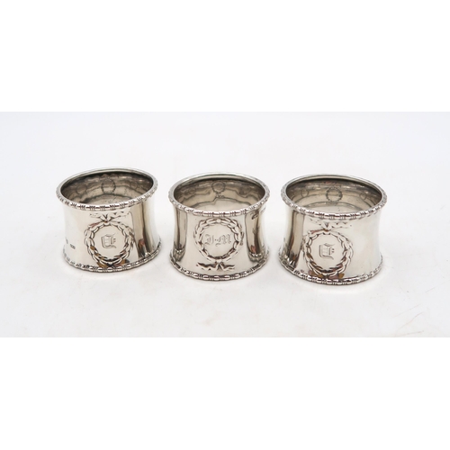 370 - A collection of silver napkin rings, including a set of three by Docker & Burn Ltd, Birmingham, ... 