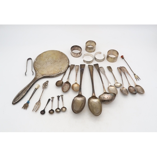 372 - A collection of silver including a pair of George II bottom marked table spoons, London 1736, in the... 