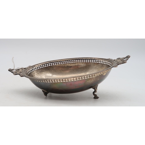 378 - A silver bowl, by Brook & Son, Sheffield 1921, of oval form, with cast ribbon handles, and a sil... 