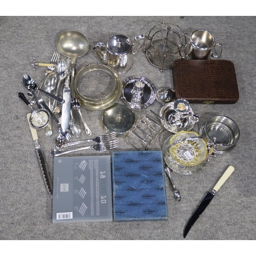 388 - A collection of EPNS including loose cutlery, chambersticks, ladles, hand mirrors etc