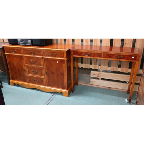 60 - A lot of a 20th century yew wood sideboard with three short drawers over three drawers flanked by ca... 