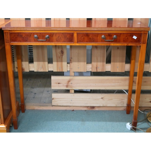 60 - A lot of a 20th century yew wood sideboard with three short drawers over three drawers flanked by ca... 