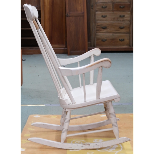 69 - A 20th century white painted rail back rocking chair, 102cm high x 62cm wide x 70cm deep