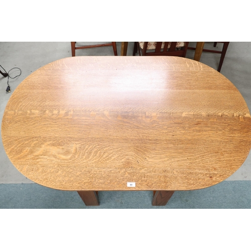 89 - An early to mid 20th century oak E Gomme D end table on rectangular supports with carved decoration ... 