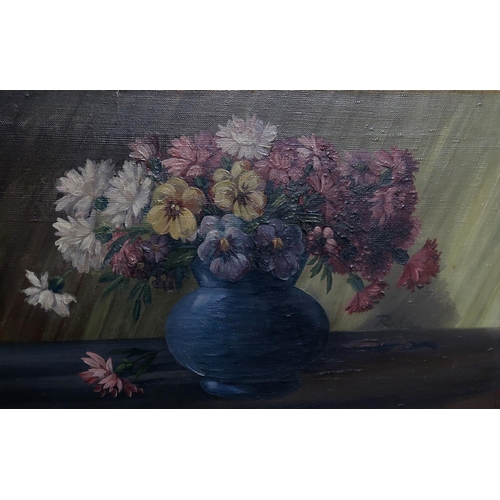 916 - RIHA Mixed flowers in a vase, signed, oil on canvas, 31 x 49cm