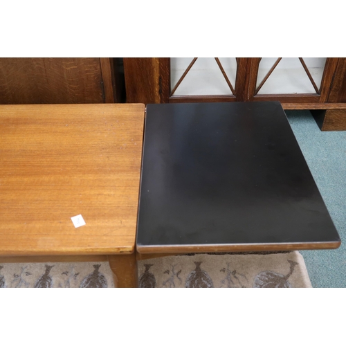 92 - A mid 20th century teak Nathan drop end coffee table on shaped tapering supports, 46cm high x 122cm ... 