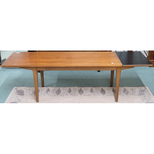 92 - A mid 20th century teak Nathan drop end coffee table on shaped tapering supports, 46cm high x 122cm ... 