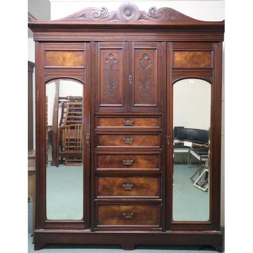 99 - A Victorian mahogany and walnut veneered bedroom suite consisting compactum wardrobe with pair of ca... 