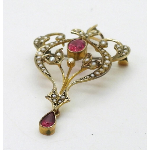 704 - A 9ct gold Edwardian pendant brooch, set with pearls and red gems, with a detachable bail. Length 5.... 