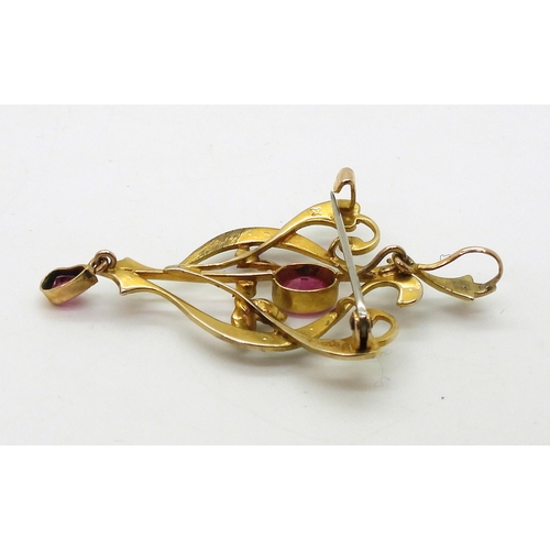 704 - A 9ct gold Edwardian pendant brooch, set with pearls and red gems, with a detachable bail. Length 5.... 