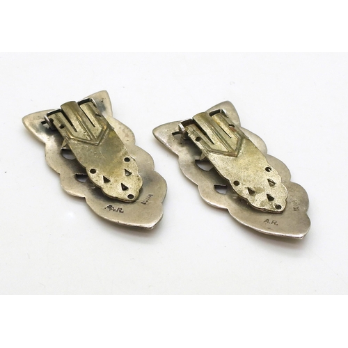 709 - A pair of silver Alexander Richie dress clips in white metal stamped A.R Iona to the reverse. Length... 