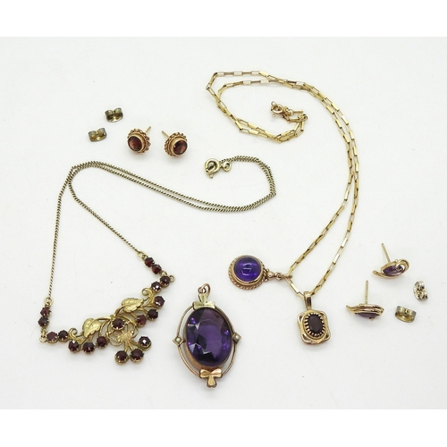 715 - A collection of gold and yellow metal jewellery to include, amethyst and garnet pendants with simila... 