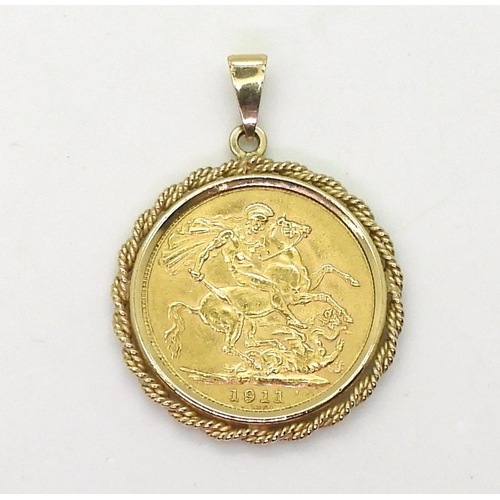A 1911 full gold sovereign in a 9ct gold pendant mount weight 9.8gms