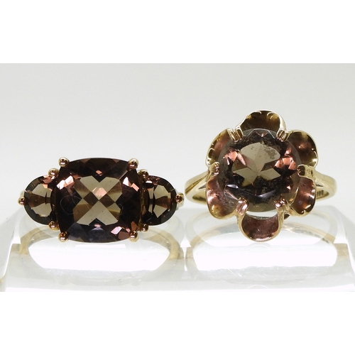 723 - A retro 9ct gold ring set with a smoky quartz colour glass gem, size O1/2, together with a 9ct gold ... 