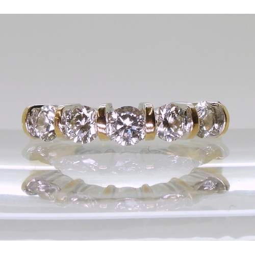 731 - An 18ct gold five stone diamond ring, set with estimated approx 1.10cts of brilliant cut diamonds. S... 