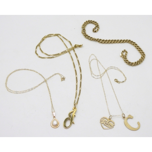 733 - A 9ct gold figaro chain, with a handmade 'J' pendant, length 46cm,  a 9ct gold rope chain lengt... 