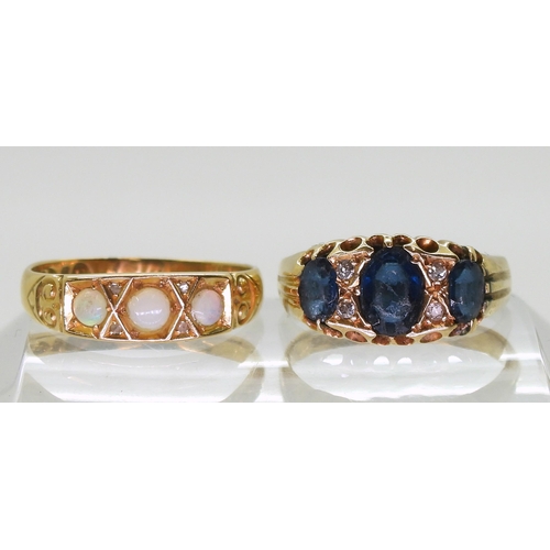 753 - An 18ct gold three opal ring with rose cut diamonds, Chester hallmarks for 1903, size Q1/2 and a 18c... 