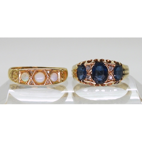 753 - An 18ct gold three opal ring with rose cut diamonds, Chester hallmarks for 1903, size Q1/2 and a 18c... 