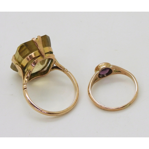 755 - A 9ct gold large citrine ring, citrine approx 18mm x 13mm, finger size P1/2, and a 9ct purple gem ri... 