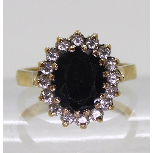 756 - A 9ct gold sapphire and cz cluster ring size O1/2, weight 4.8gms