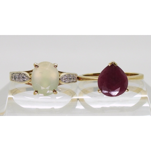 761 - A 9ct gold opaque ruby ring, finger size N1/2, together with a 9ct gold prehnite and  clear gem... 