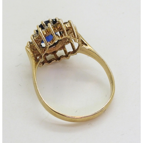 762 - A 9ct gold blue and  clear gem cluster ring, size O, weight 2.5gms