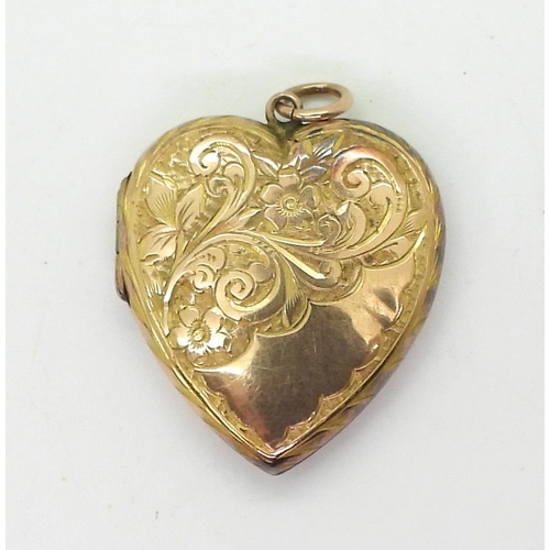 766 - A 9ct gold heart shaped locket with all over flowers & leaves engraving, hallmarked Birmingham 1... 