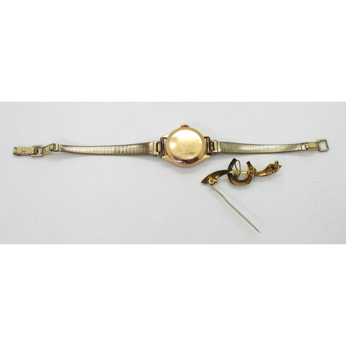 780 - An 18ct gold ladies Herodia watch head with a gold plated strap, weight 15gms, together with a yello... 