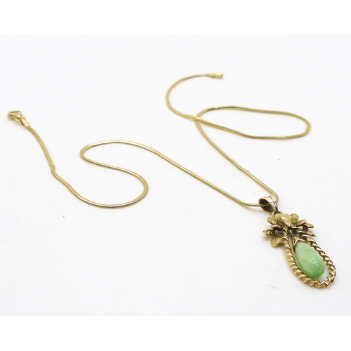 792 - A 14k gold Chinese green hardstone pendant weight 2.5gms, together with a 9ct gold snake chain weigh... 