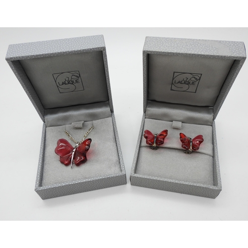 865 - Lalique pink glass butterfly clip on earrings and matching pendant, mounted in silver, all signed wi... 