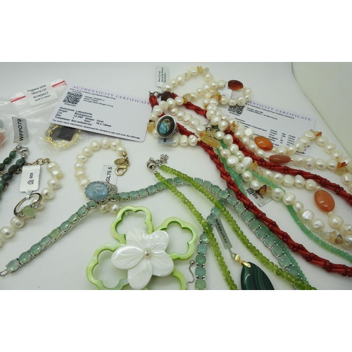 875 - A collection of The Jewellery Channel items, to include a graduated emerald bead necklace, a red tig... 