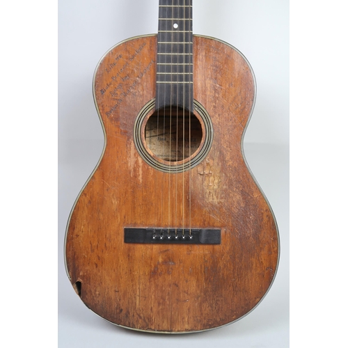 572 - WWII MILITARY INTEREST an acoustic guitar the body bearing an inscribed record of World War II battl... 