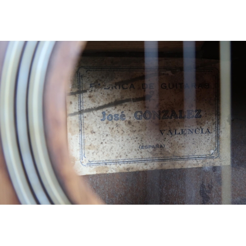 572 - WWII MILITARY INTEREST an acoustic guitar the body bearing an inscribed record of World War II battl... 