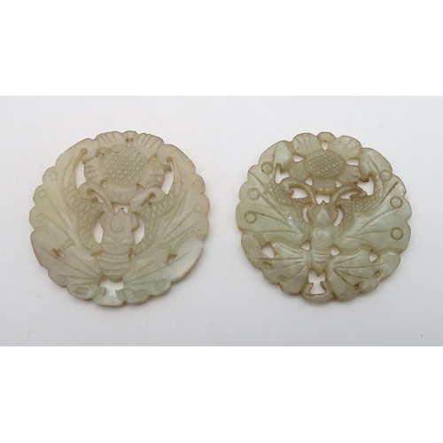 275 - Two Chinese hardstone pale celadon butterfly plaques, another stylised dragon plaque, a shou charact... 