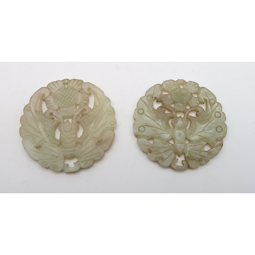 275 - Two Chinese hardstone pale celadon butterfly plaques, another stylised dragon plaque, a shou charact... 