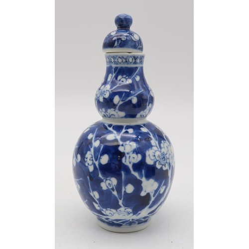 276 - A miniature Satsuma vase, of bulbous form, decorated with a panel of figures surrounded by flowers, ... 