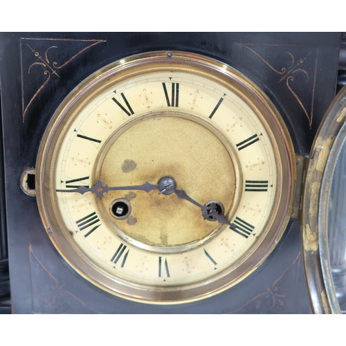 285 - A ebonised wood mantle clock, in the style of a slate clock