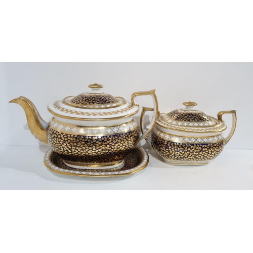 293 - A blue and gilt New Hall teaset comprising teapot and stand, sugar bowl, slop bowl, cake plate, and ... 