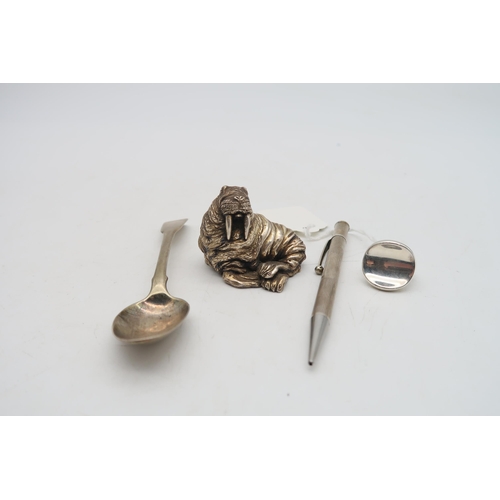 386B - An Italian silver model of a walrus, by Alessandro Magrino, with import marks, a silver pen, by Cohe... 