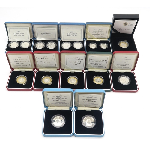 497 - Eleven cased Royal Mint silver proof two pound coins, including three two-coin sets, together with a... 