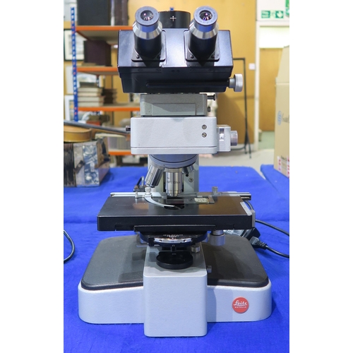 513 - A Leitz Wetzlar Orthoplan biological microscope, fitted with phase contrast/brightfield objective le... 