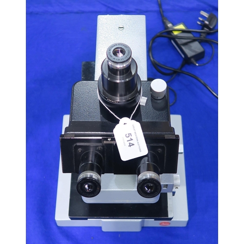 514 - A Leitz Wetzlar Ortholux biological microscope, fitted with brightfield objective lenses x10, x16, x... 