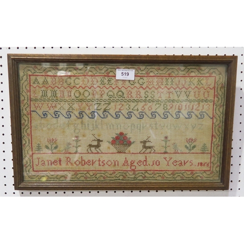 519 - A Victorian needlework sampler, executed by Janet Robertson, Aged 10 Years, 1866, framed under glass... 