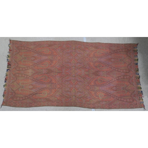 545 - A large Paisley shawl, measuring approx. 330cm x 166cm