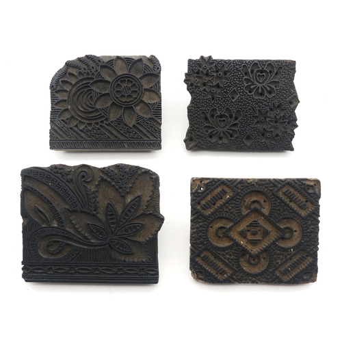 547 - Four carved wooden fabric printing blocks, likely of Indian origin